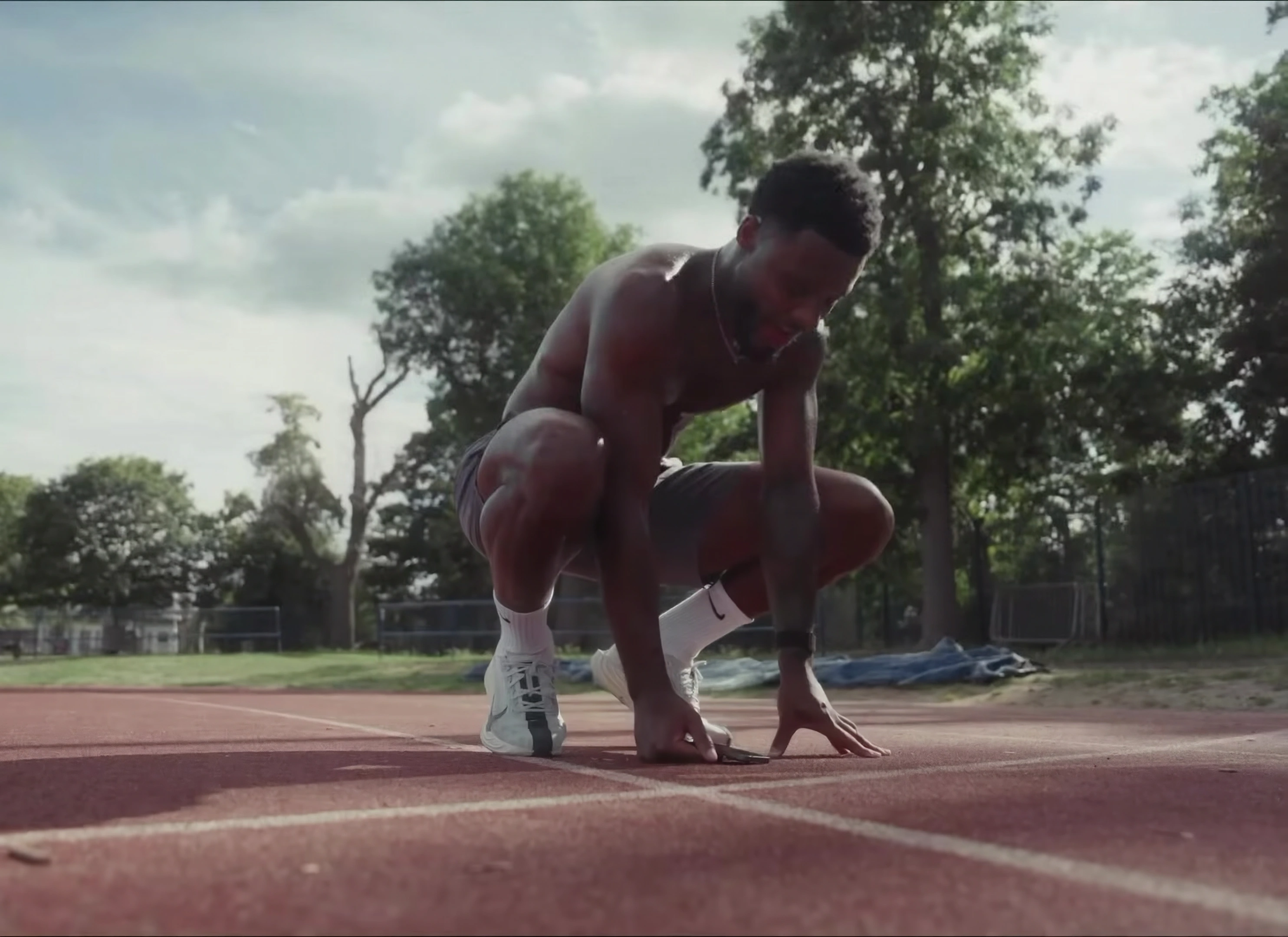 Sam Graham preparing for a sprint on the running track